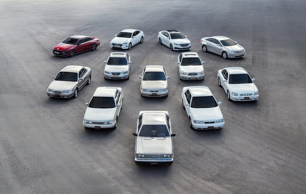 An aerial shot of Hyundai Sonata cars parked in a circular formation outdoors during the day.